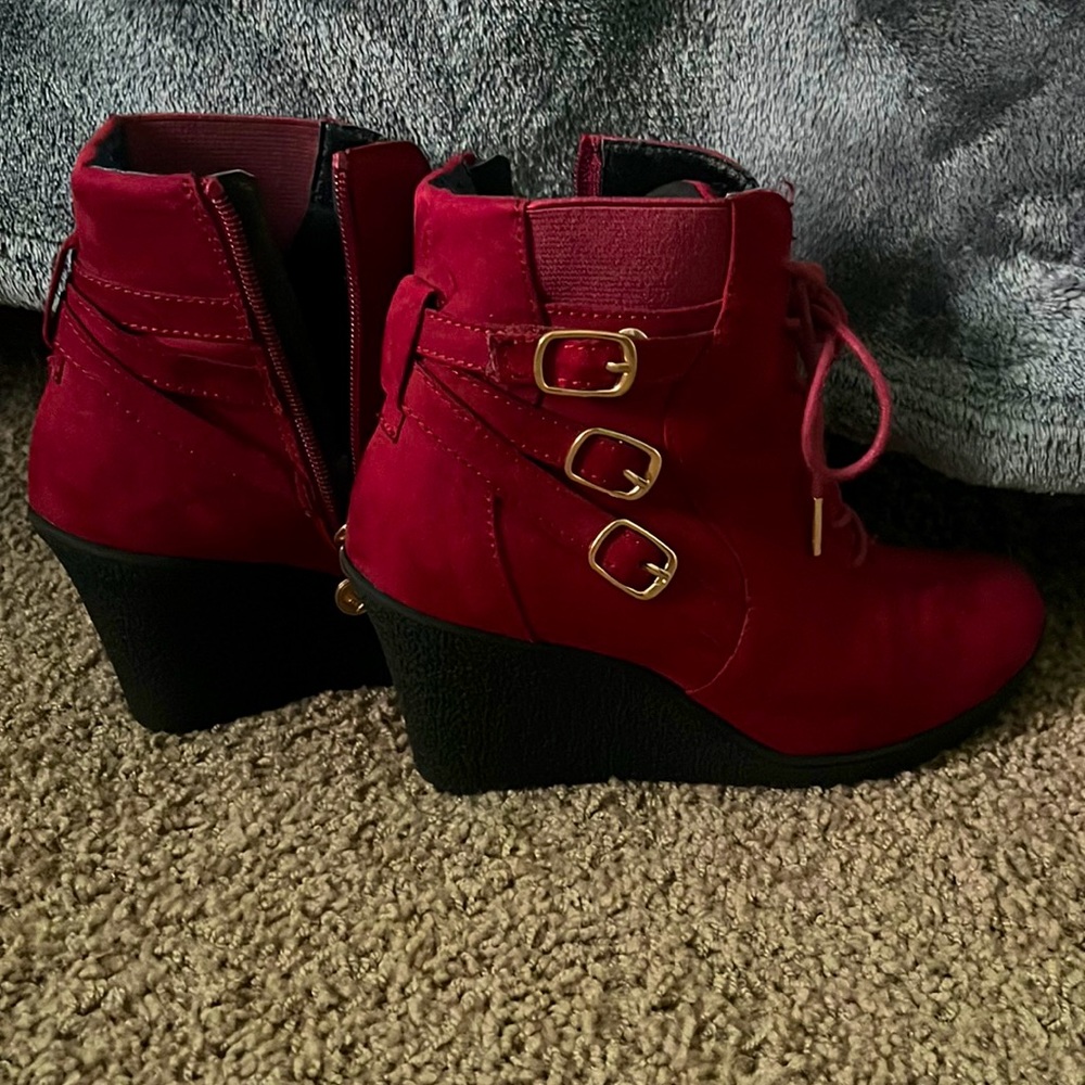 Ankle heel burgundy/red swade boots for sale. Fairly used.